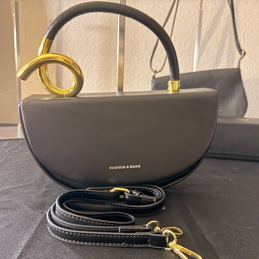 Black Handbag with Gold Accents